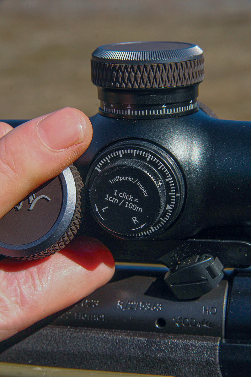 Removing the windage turret cover cap reveals a raised knob and hash-mark base that is moved against a static hash mark. A wedge serves as 0, the system includes two set screws that allow returning the wedge to zero.